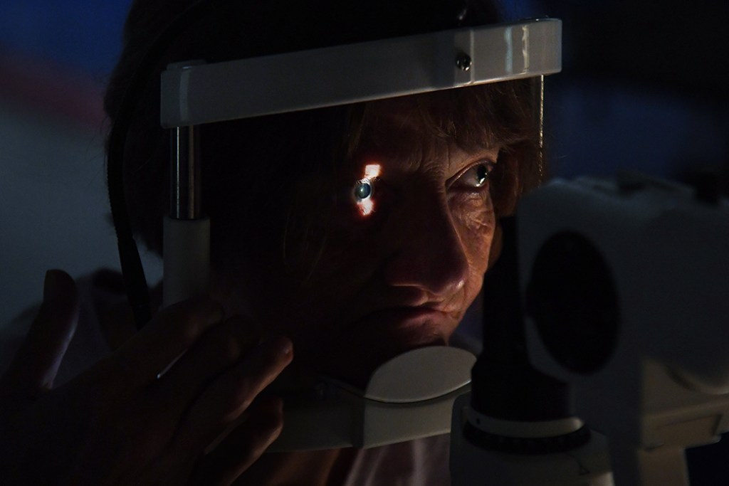 A woman gets her eyes checked at a free clinic in Tennessee, June 2019. (Getty/Michael S. Williamson/The Washington Post)